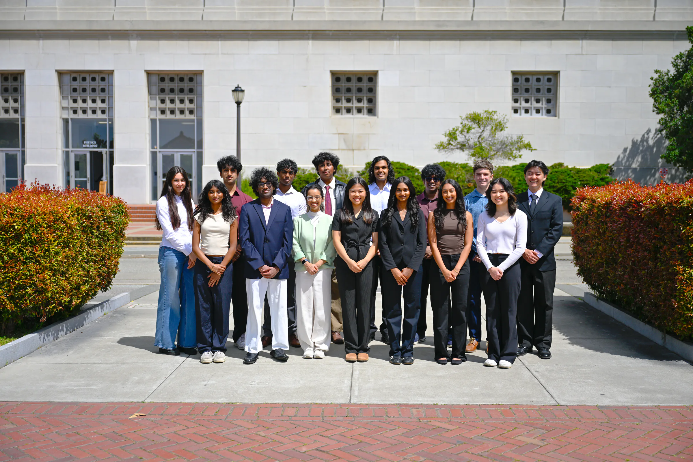 Computational Biology at Berkeley members posing together outside a campus building.